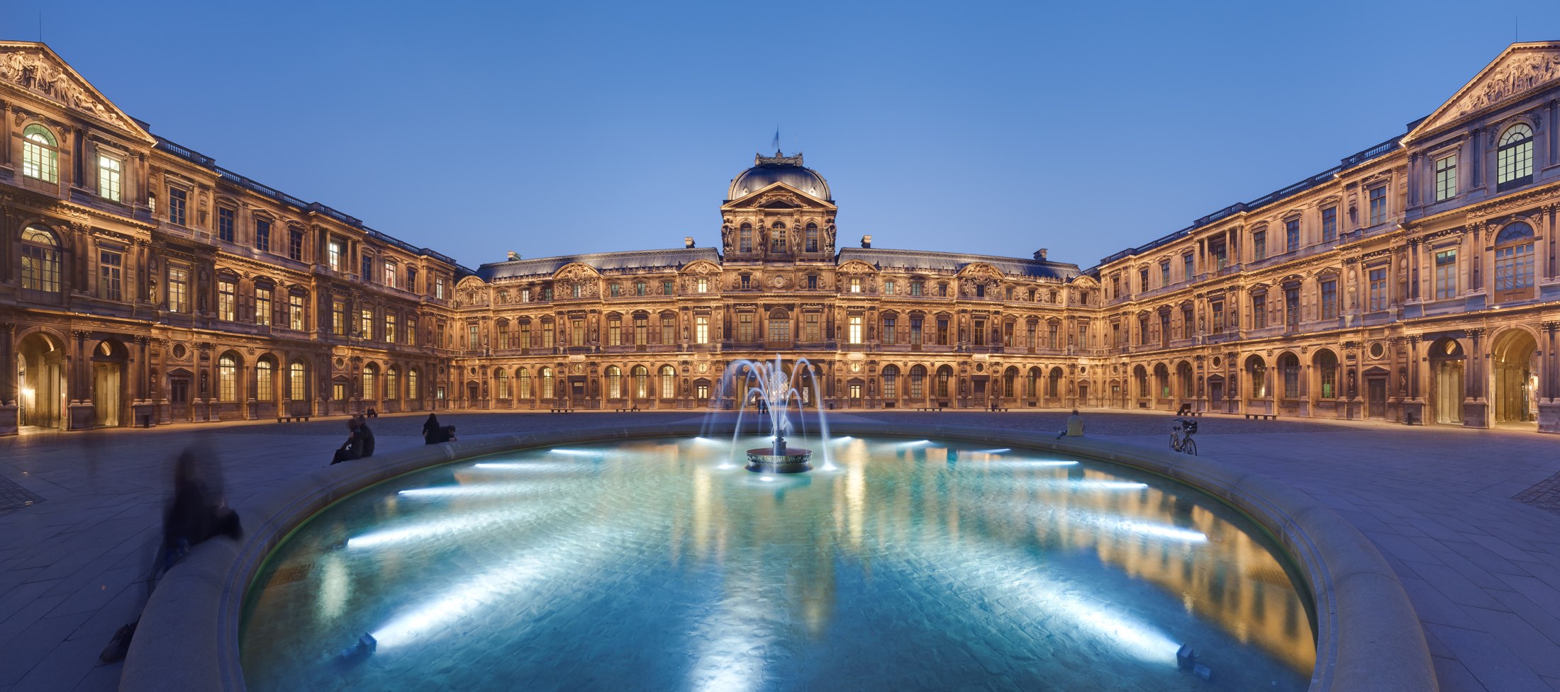 Louvre historic Cour Carrée at dusk